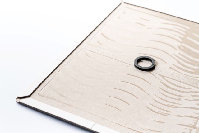 服に付いたネズミ捕り粘着